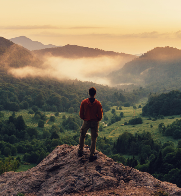 hiker on top of mountain